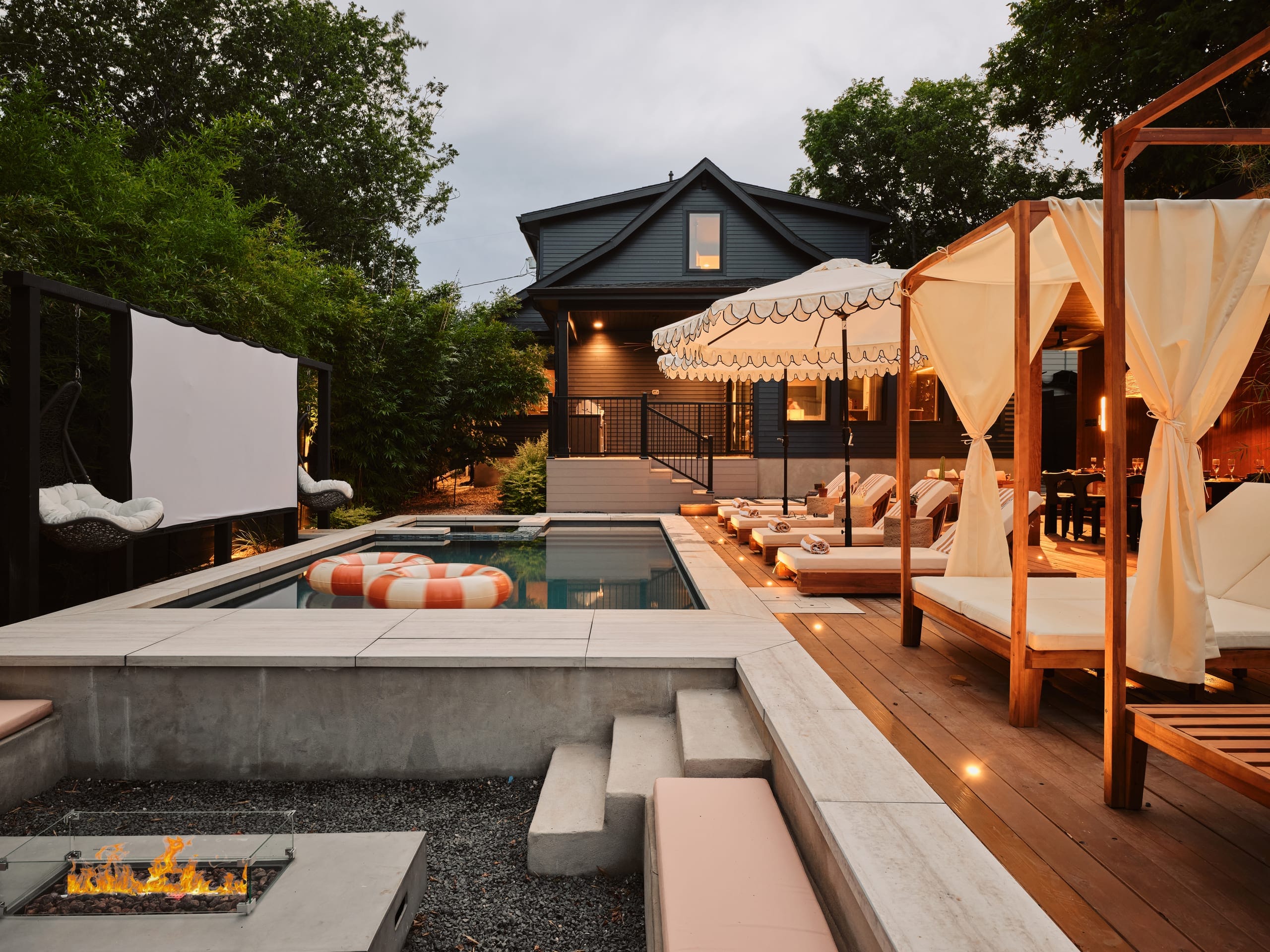 Custom deck with the pool and sunken fire pit lounge