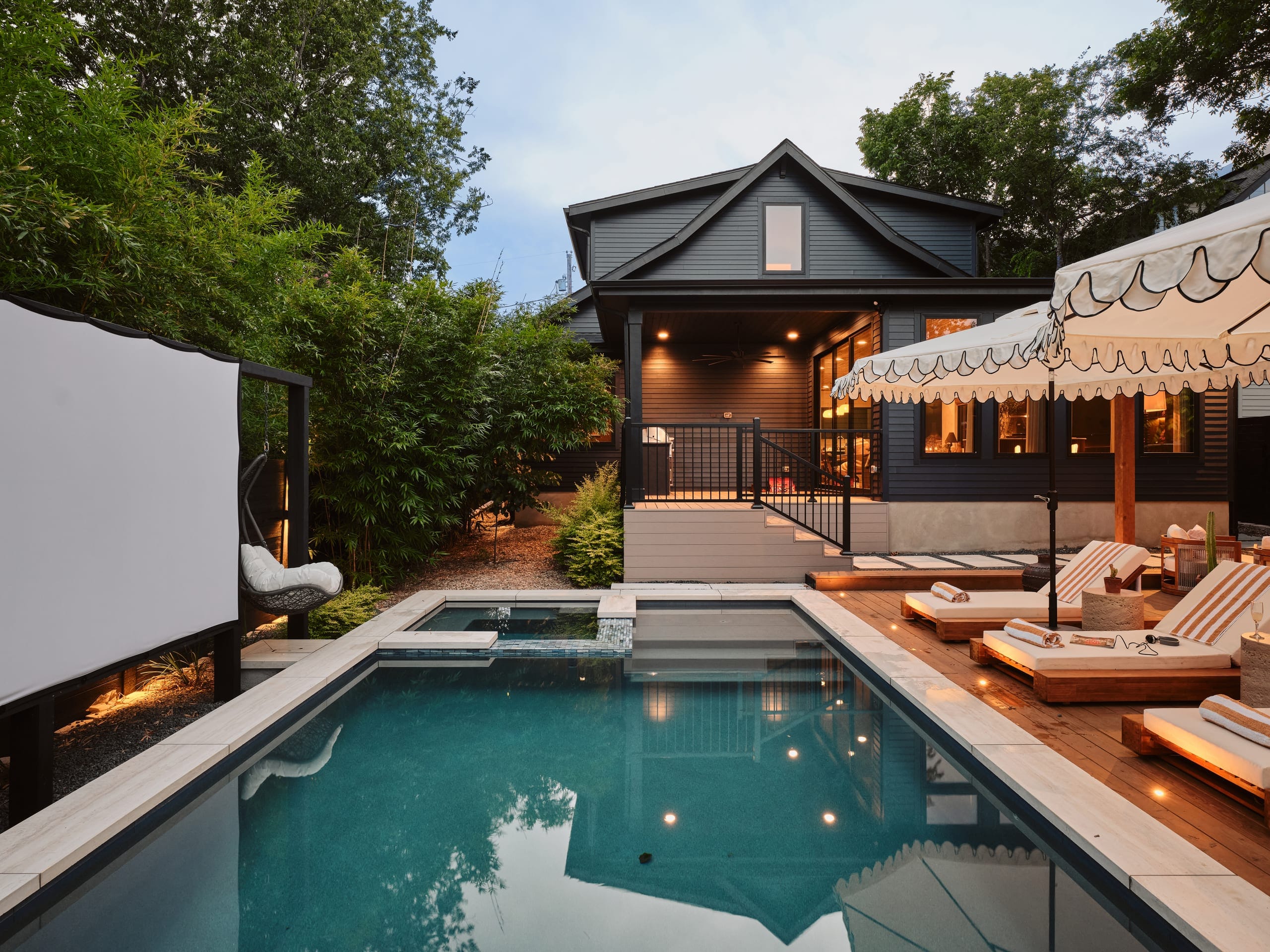 The pool and spa with the house behind