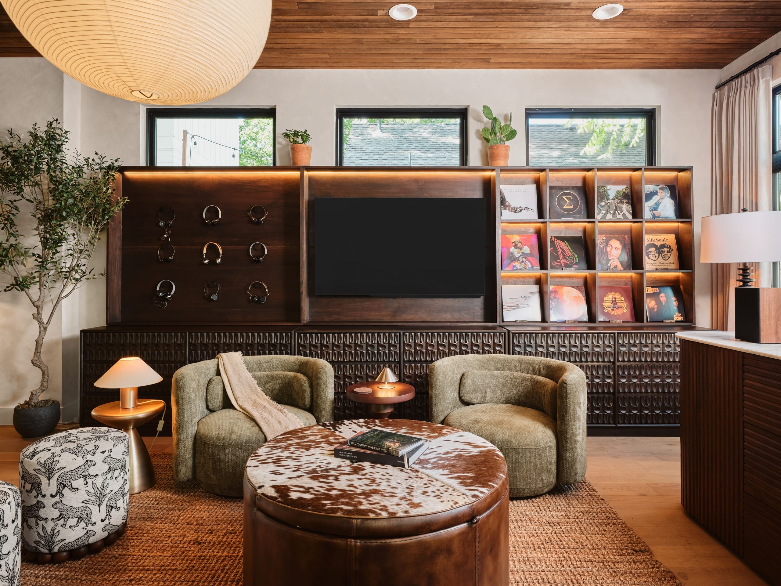 Cowhide ottoman and lounge seating in the vinyl room