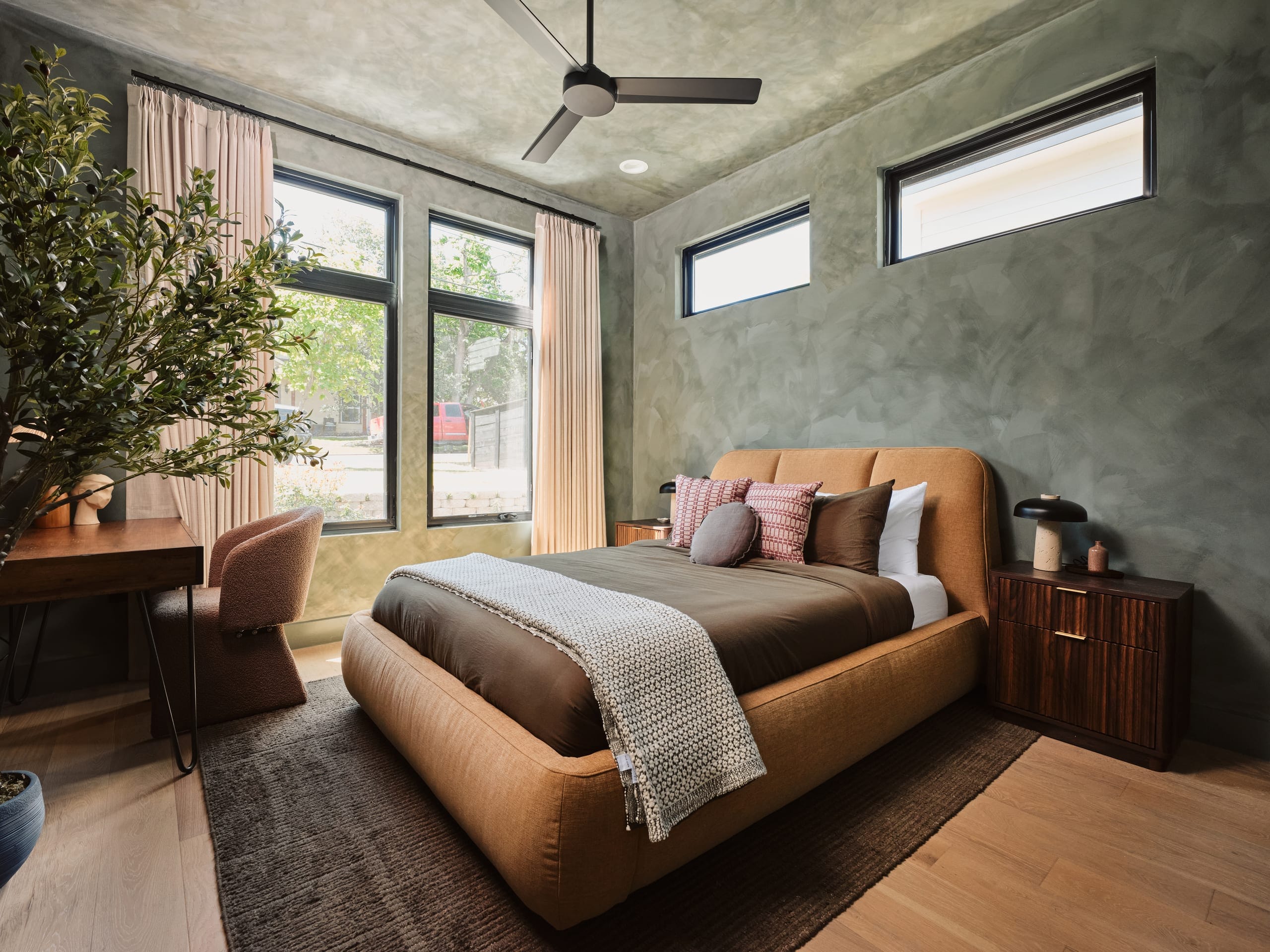 The Writers Room in sage limewash with a queen bed